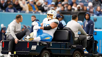 Los Angeles Chargers offensive tackle Joe Alt is carted off the field during a Week 9 matchup with the Tennessee Titans
