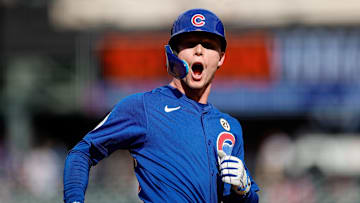 Sep 15, 2024; Denver, Colorado, USA; Chicago Cubs center fielder Pete Crow-Armstrong (52) celebrates as he rounds the bases on a two run home run in the ninth inning against the Colorado Rockies at Coors Field.