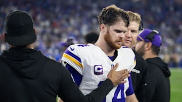 Jan 13, 2025; Glendale, AZ, USA; Minnesota Vikings quarterback Sam Darnold (14) reacts in the closing seconds of the game against the Los Angeles Rams during an NFC wild card game at State Farm Stadium. Mandatory Credit: Mark J. Rebilas-Imagn Images