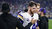 Jan 13, 2025; Glendale, AZ, USA; Minnesota Vikings quarterback Sam Darnold (14) reacts in the closing seconds of the game against the Los Angeles Rams during an NFC wild card game at State Farm Stadium. Mandatory Credit: Mark J. Rebilas-Imagn Images