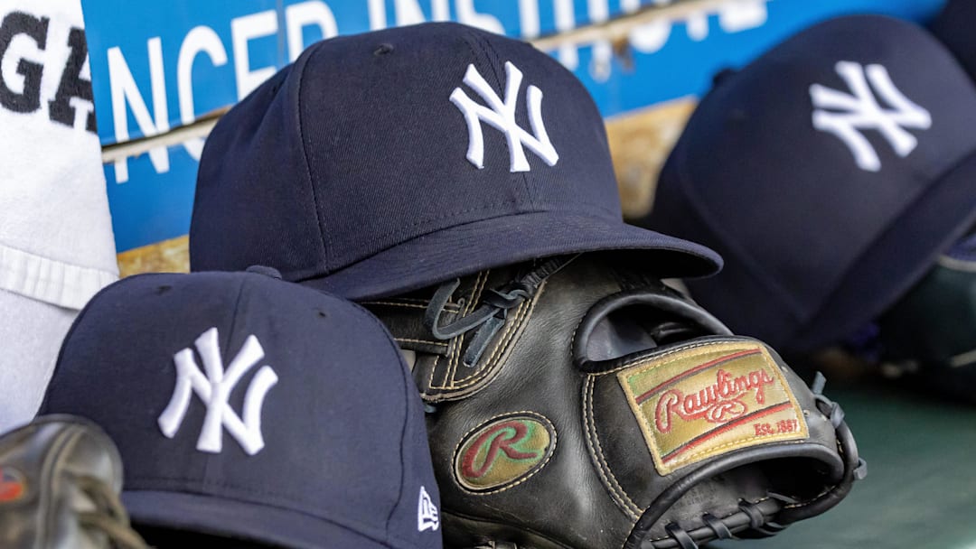 Apr 7, 2025; Detroit, Michigan, USA; New York Yankees baseball hats and gloves in the dugout out in the eighth inning against the Detroit Tigers at Comerica Park. Mandatory Credit: David Reginek-Imagn Images Apr 7, 2025; Detroit, Michigan, USA; New York Yankees baseball hats and gloves in the dugout out in the eighth inning against the Detroit Tigers at Comerica Park. Mandatory Credit: David Reginek-Imagn Images