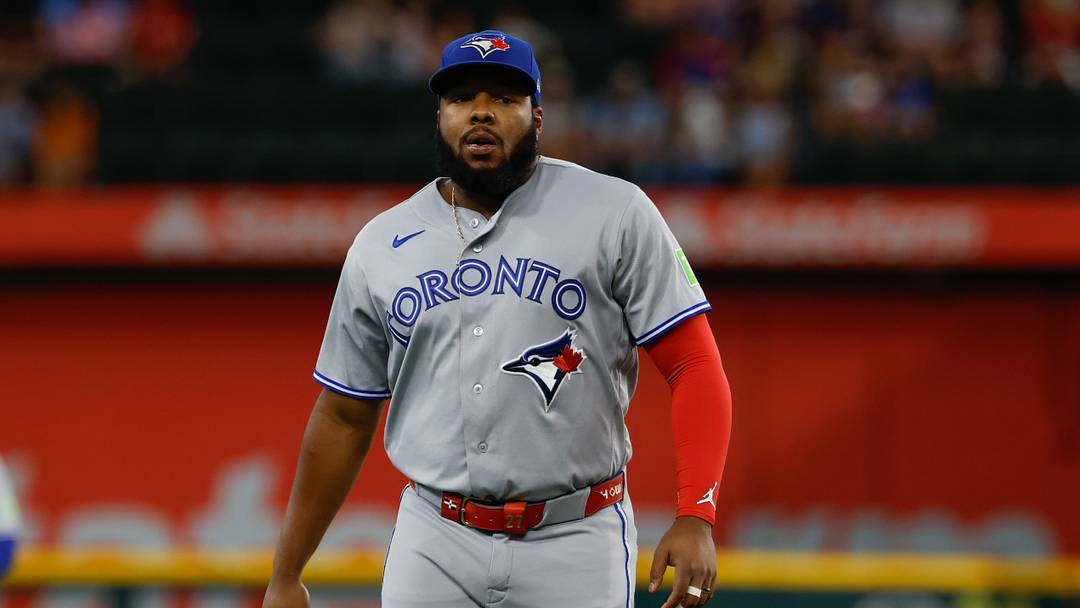 Toronto Blue Jays first baseman Vladimir Guerrero Jr. (27) looks on during the first inning against the Texas Rangers at Globe Life Field.  Mandatory Credit: Chris Jones-Imagn Images