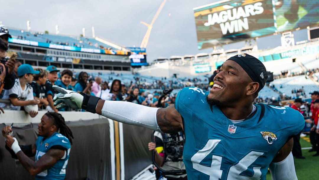 Jacksonville Jaguars defensive end Travon Walker (44) celebrates with fans at EverBank Stadium, Sunday, Dec. 14, 2025, in Jacksonville, Fla. The Jaguars defeated the Jets 48-20. [Doug Engle/Florida Times-Union]