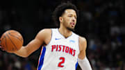 Jan 7, 2024; Denver, Colorado, USA; Detroit Pistons guard Cade Cunningham (2) controls the ball during the first quarter against the Denver Nuggets at Ball Arena. Mandatory Credit: Ron Chenoy-Imagn Images