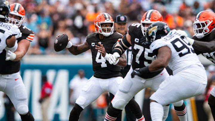 Sep 15, 2024; Jacksonville, Florida, USA; Cleveland Browns quarterback Deshaun Watson (4) drops to throws against the Jacksonville Jaguars in the first quarter at EverBank Stadium. Mandatory Credit: Jeremy Reper-Imagn Images