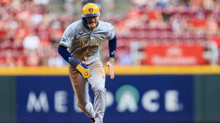 Milwaukee Brewers second baseman Brice Turang (2) runs to third on a single hit by designated hitter William Contreras (not pictured) in the first inning against the Cincinnati Reds at Great American Ball Park in August 2024.