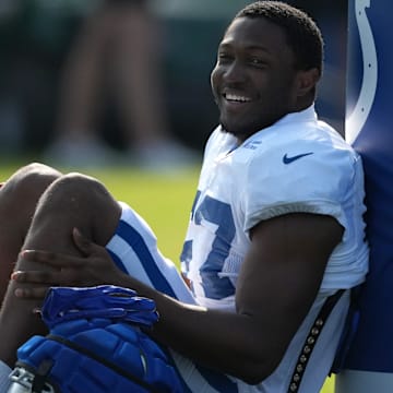 Indianapolis Colts linebacker Jaylon Carlies (57) sits before practice begins during training camp Tuesday, July 30, 2024, at Grand Park Sports Complex in Westfield.