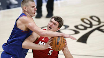 Jun 1, 2023; Denver, CO, USA; Denver Nuggets center Nikola Jokic (15) knocks the ball away from Miami Heat forward Nikola Jovic (5) during the fourth quarter in game one of the 2023 NBA Finals at Ball Arena. Mandatory Credit: Isaiah J. Downing-Imagn Images