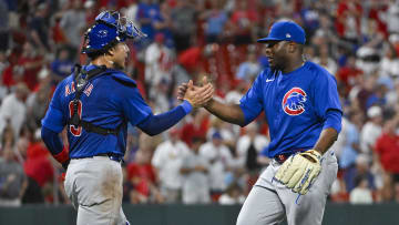 Jul 12, 2024; St. Louis, Missouri, USA;  Chicago Cubs relief pitcher Hector Neris (51) celebrates catcher Miguel Amaya (9) after the Cubs defeated the St. Louis Cardinals at Busch Stadium. 