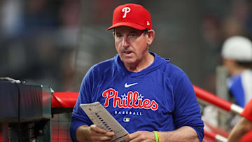Aug 21, 2024; Atlanta, Georgia, USA; Philadelphia Phillies manager Rob Thomson (59) in the dugout against the Atlanta Braves in the sixth inning at Truist Park.