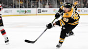 Jan 23, 2025; Boston, Massachusetts, USA; Boston Bruins left wing Brad Marchand (63) takes a shot against the Ottawa Senators during the first period at the TD Garden. Mandatory Credit: Brian Fluharty-Imagn Images
