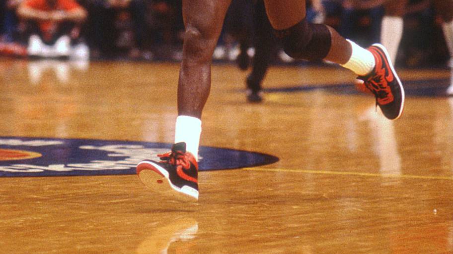 Michael Jordan sets up Bulls offense against the Knicks during an exhibition game at Madison Square Garden in New York.