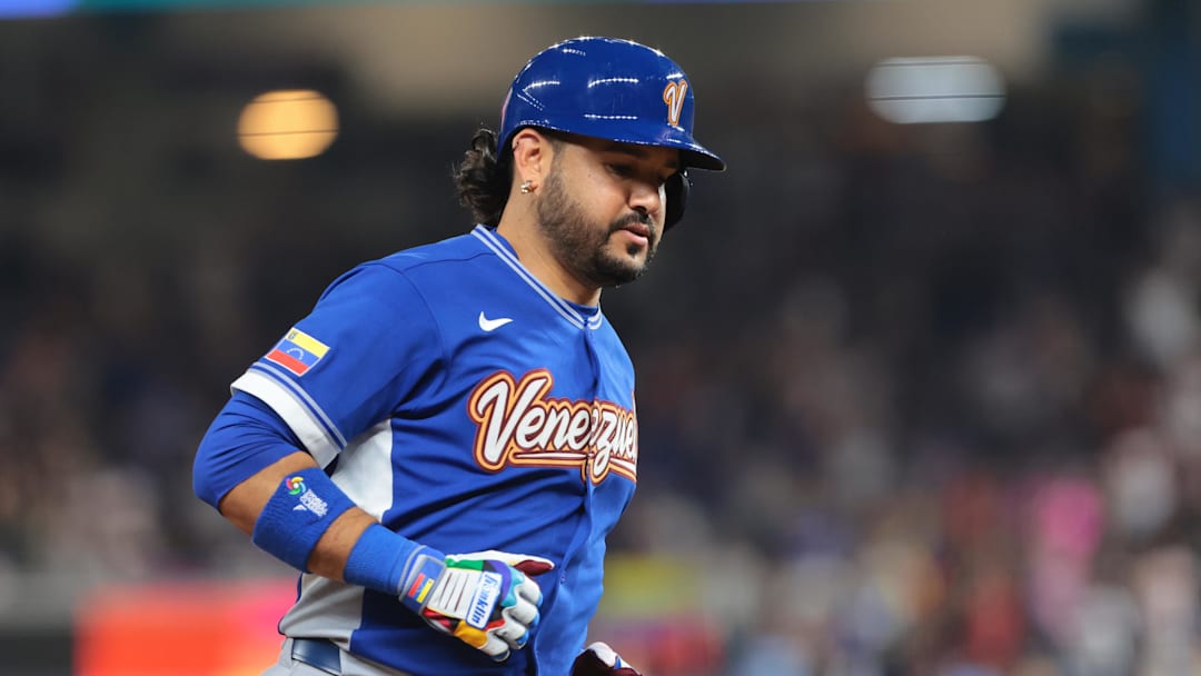 Mar 16, 2026; Miami, FL, United States; Venezuela third baseman Eugenio Suárez (7) rounds the bases after hitting a solo home run against Italy in the fourth inning during a semifinal game of the 2026 World Baseball Classic at loanDepot Park. Mandatory Credit: Sam Navarro-Imagn Images