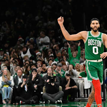 Dec 25, 2024; Boston, Massachusetts, USA; Boston Celtics forward Jayson Tatum (0) react to game action during the second half against the Philadelphia 76ers at TD Garden. Mandatory Credit: Eric Canha-Imagn Images