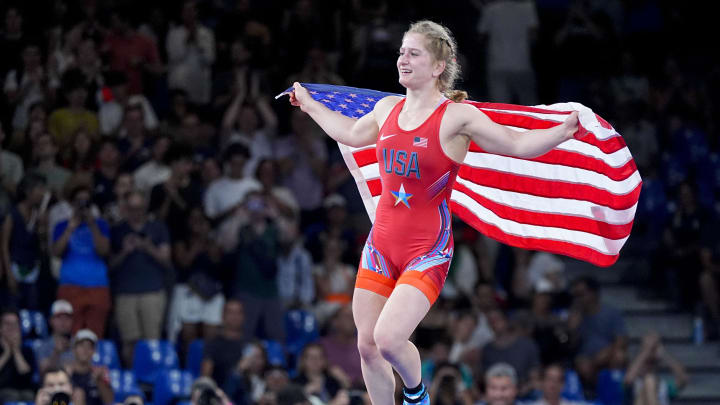 Aug 6, 2024; Paris, France; Amit Elor (USA) celebrates her win over Meerim Zhumanazarova (Kyrgyzstan) in the gold medal match during the Paris 2024 Olympic Summer Games at Champ-de-Mars Arena. Mandatory Credit: Sarah Phipps-USA TODAY Sports