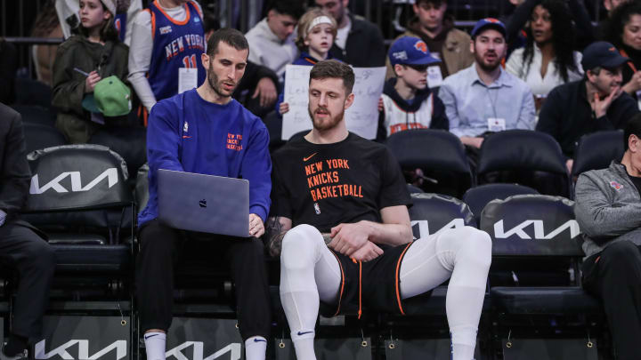 Jan 9, 2024; New York, New York, USA; New York Knicks center Isaiah Hartenstein (right) talks with Assistant Director of Player Development Scott King prior to the game against the Portland Trail Blazers at Madison Square Garden.