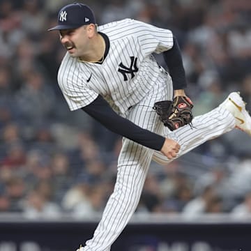 Oct 22, 2022; Bronx, New York, USA;  New York Yankees relief pitcher Lou Trivino (56) pitches in the seventh inning against the Houston Astros during game three of the ALCS for the 2022 MLB Playoffs at Yankee Stadium. 