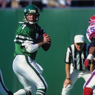 Oct 24, 1993; East Rutherford, NJ, USA; FILE PHOTO; New York Jets quarterback Boomer Esiason (7) in action against the Buffalo Bills at Giants Stadium. 