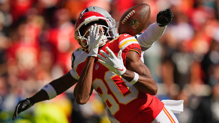 Oct 19, 2025; Kansas City, Missouri, USA; Las Vegas Raiders cornerback Darnay Holmes (30) breaks up a pass intended for Kansas City Chiefs wide receiver Tyquan Thornton (80) during the second quarter of the game at GEHA Field at Arrowhead Stadium.