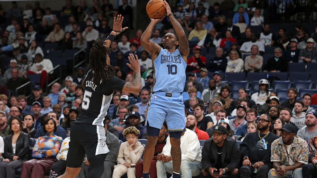 Jan 6, 2026; Memphis, Tennessee, USA; Memphis Grizzlies guard Javon Small (10) shoots during the fourth quarter against the San Antonio Spurs at FedExForum. Mandatory Credit: Petre Thomas-Imagn Images