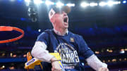 Hurley cutting down the net after UConn’s latest national championship.