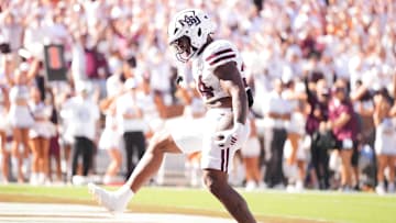 Mississippi State running back Fluff Bothwell (24) celebrates a touchdown during a college football game between Tennessee and Mississippi State at Davis Wade Stadium in Starkville, Miss., on Sept. 27, 2025.