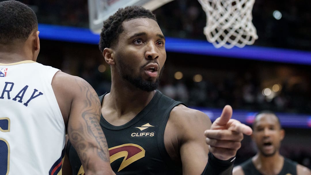 Mar 21, 2026; New Orleans, Louisiana, USA; Cleveland Cavaliers guard Donovan Mitchell (45) points to the referee for a and one foul shot after making a basket against New Orleans Pelicans guard Dejounte Murray (5) during the second half at Smoothie King Center. Mandatory Credit: Matthew Hinton-Imagn Images Mar 21, 2026; New Orleans, Louisiana, USA; Cleveland Cavaliers guard Donovan Mitchell (45) points to the referee for a and one foul shot after making a basket against New Orleans Pelicans guard Dejounte Murray (5) during the second half at Smoothie King Center. Mandatory Credit: Matthew Hinton-Imagn Images