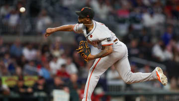 Jul 2, 2024; Atlanta, Georgia, USA; San Francisco Giants relief pitcher Camilo Doval (75) throws against the Atlanta Braves in the ninth inning at Truist Park.