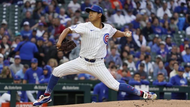 Aug 6, 2024; Chicago, Illinois, USA; Chicago Cubs pitcher Shota Imanaga (18) throws the ball against the Minnesota Twins during the first inning at Wrigley Field.