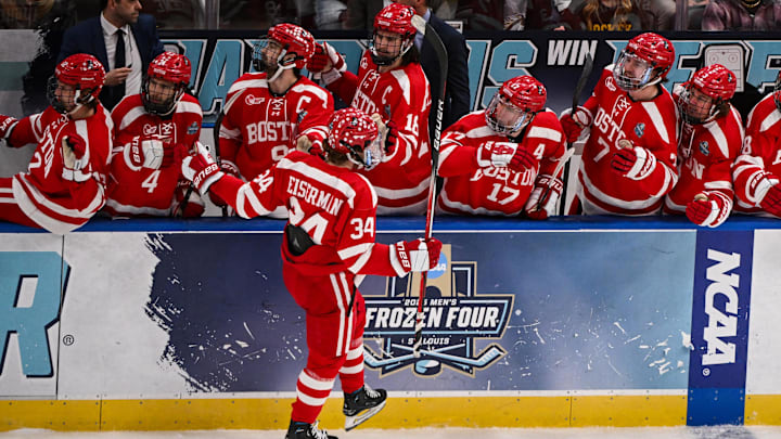 Apr 12, 2025; St. Louis, Missouri, UNITED STATES; Boston University Terriers forward Cole Eiserman (34) celebrates with teammates after scoring a goal against the Western Michigan Broncos during the first period of the Frozen Four college ice hockey national championship at Enterprise Center. Mandatory Credit: Connor Hamilton-Imagn Images