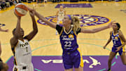 May 24, 2024; Los Angeles, California, USA;  Los Angeles Sparks forward Cameron Brink (22) blocks a shot by Indiana Fever forward Aliyah Boston (7) in the first half at Crypto.com Arena. Mandatory Credit: Jayne Kamin-Oncea-Imagn Images