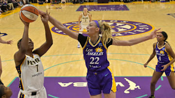 May 24, 2024; Los Angeles, California, USA;  Los Angeles Sparks forward Cameron Brink (22) blocks a shot by Indiana Fever forward Aliyah Boston (7) in the first half at Crypto.com Arena. Mandatory Credit: Jayne Kamin-Oncea-Imagn Images