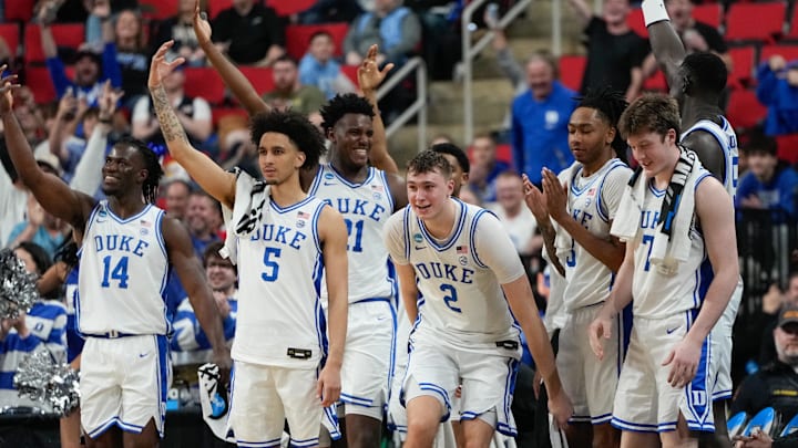 Mar 21, 2025; Raleigh, NC, USA; The Duke basketball bench celebrates during the second half against the Mount St. Mary's Mountaineers in the first round of the NCAA Tournament at Lenovo Center.