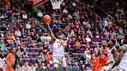 Mar 1, 2025; Blacksburg, Virginia, USA;  Virginia Tech Hokies guard Ben Hammond (11) goes up for a layup during the second half against the Syracuse Orange at Cassell Coliseum. Mandatory Credit: Brian Bishop-Imagn Images