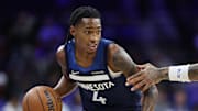 Oct 17, 2025; Philadelphia, Pennsylvania, USA; Minnesota Timberwolves guard Rob Dillingham (4) dribbles the ball against the Philadelphia 76ers during the first quarter at Xfinity Mobile Arena. Mandatory Credit: Bill Streicher-Imagn Images