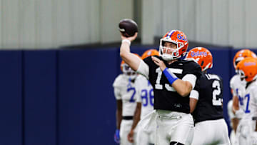 Florida Gators quarterback Harrison Bailey (15) throws the ball during fall football practice at Sanders Indoor Practice Fields at the University of Florida in Gainesville, FL on Thursday, August 7, 2025. [Matt Pendleton/Gainesville Sun]