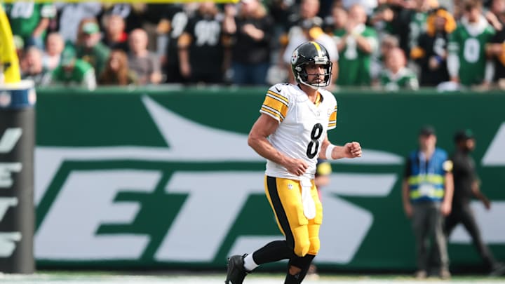 Sep 7, 2025; East Rutherford, New Jersey, USA; Pittsburgh Steelers quarterback Aaron Rodgers (8) runs off the field during the second half against the New York Jets at MetLife Stadium. Mandatory Credit: Vincent Carchietta-Imagn Images