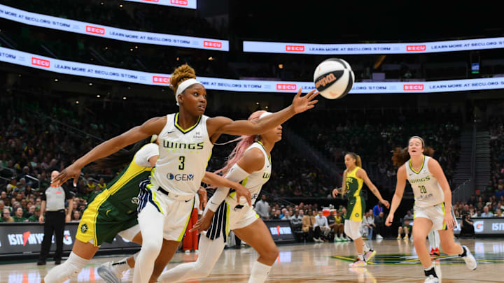 Jun 3, 2025; Seattle, Washington, USA; Dallas Wings guard Kaila Charles (3) rebounds the ball during the second half against the Seattle Storm at Climate Pledge Arena. 
