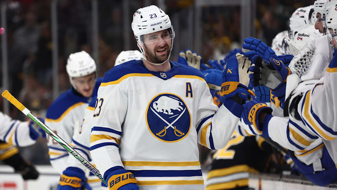 May 1, 2026; Boston, Massachusetts, USA; Buffalo Sabres defenseman Mattias Samuelsson (23) is congratulated at the bench after scoring against the Boston Bruins during the first period of game six of the first round of the 2026 Stanley Cup Playoffs at TD Garden. Mandatory Credit: Winslow Townson-Imagn Images