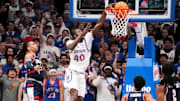 Dec 2, 2025; Lawrence, Kansas, USA; Kansas Jayhawks forward Flory Bidunga (40) dunks the ball against the UConn Huskies during the first half of the game at Allen Fieldhouse. Mandatory Credit: Denny Medley-Imagn Images