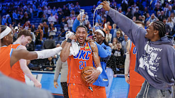 Feb 1, 2025; Oklahoma City, Oklahoma, USA; Oklahoma City Thunder guard Aaron Wiggins (21) has water poured on him by his teammates after his career high points performance against the Sacramento Kings during the second half at Paycom Center. Mandatory Credit: Alonzo Adams-Imagn Images