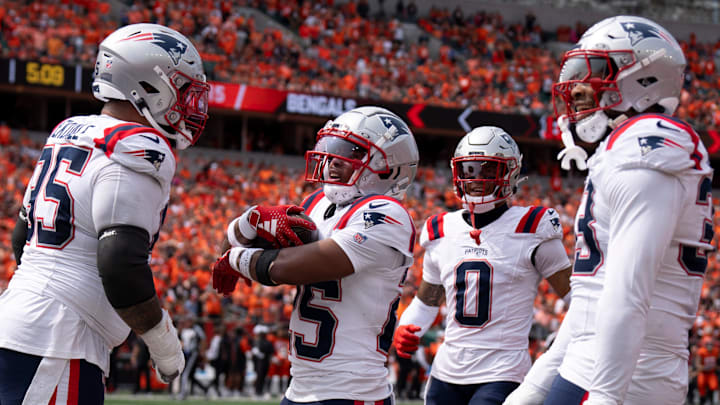 New England Patriots corner back Marcus Jones (25) recovers a fumble in the second quarter of the NFL game against the Cincinnati Bengals at Paycor Stadium in Cincinnati on Sunday, Sept. 8, 2024.