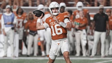 Texas Longhorns quarterback Arch Manning throws a touchdown pass at Darrell K Royal-Texas Memorial Stadium. 