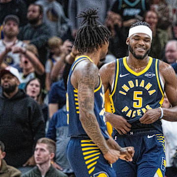 Nov 1, 2025; Indianapolis, Indiana, USA; Indiana Pacers guard Quenton Jackson (29) celebrates a made basket in the second half  against the Golden State Warriors at Gainbridge Fieldhouse. Mandatory Credit: Trevor Ruszkowski-Imagn Images