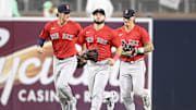 Aug 8, 2025; San Diego, California, USA; Boston Red Sox right fielder Roman Anthony (19), left, Wilyer Abreu (52), center, and Jarren Duran (16) leave the field after the Red Sox beat the San Diego Padres at Petco Park. Mandatory Credit: Denis Poroy-Imagn Images