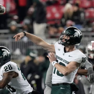 Nov. 11, 2023; Columbus, Oh., USA; 
Michigan State Spartans quarterback Andrew Schorfhaar (18) throws a pass during the second half of Saturday's NCAA Division I football game against the Ohio State Buckeyes at Ohio Stadium.