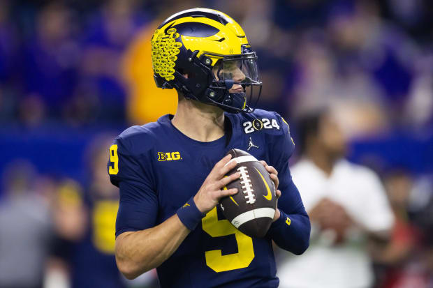 Michigan Wolverines quarterback J.J. McCarthy drops back against the Washington Huskies during the 2024 national championship