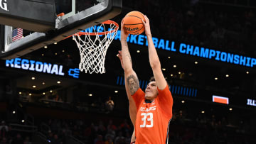 Mar 28, 2024; Boston, MA, USA;Illinois Fighting Illini forward Coleman Hawkins (33) dunks the ball against the Iowa State Cyclones in the semifinals of the East Regional of the 2024 NCAA Tournament at TD Garden. Mandatory Credit: Brian Fluharty-USA TODAY Sports