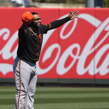 Mar 20, 2024; Tempe, Arizona, USA; San Francisco Giants infielder Pablo Sandoval reacts to fans before a Spring Training game against the Los Angeles Angels at Tempe Diablo Stadium.