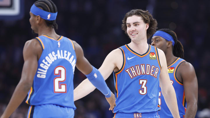 Dec 26, 2023; Oklahoma City, Oklahoma, USA; Oklahoma City Thunder guard Josh Giddey (3) celebrates with Oklahoma City Thunder guard Shai Gilgeous-Alexander (2) after a play against the Minnesota Timberwolves during the second quarter at Paycom Center. Mandatory Credit: Alonzo Adams-USA TODAY Sports